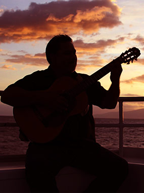 Music entertainment on private Maui sunset boat charter.