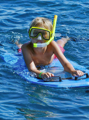 Kid Snorkeling at Molokini Crater